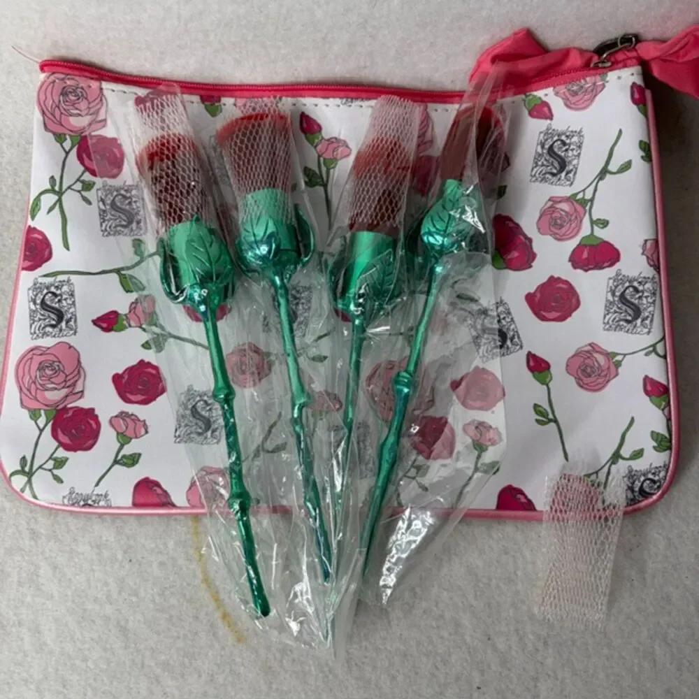 Rose makeup brush set with floral pouch and Shakespeare quote